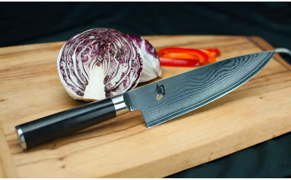 Shun Classic 8 Inch Japanese Knife Cutting Onion and Tomatoes